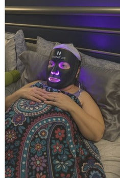 Nuovaluce customer wearing LED mask