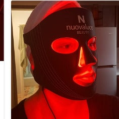 Nuovaluce customer wearing red LED mask